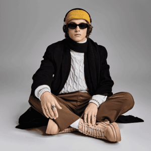 Black Bold Jacket With a Striking Yellow Cap